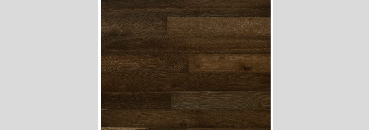 Professional belt sanding floorboards to enhance natural beauty of wooden surfaces